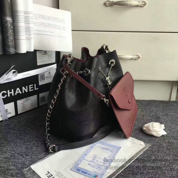 Ch**el perforated drawstring bucket bag black