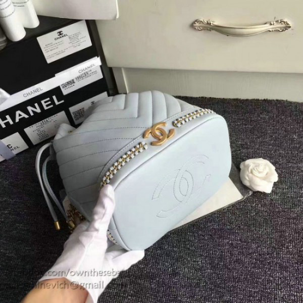 Ch**el lambskin drawstring bucket bag light blue