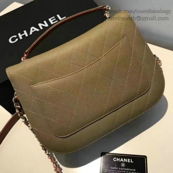 Ch**el grained calfskin flap bag with top handle green