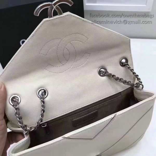 Ch**el calfskin chevron flap bag white