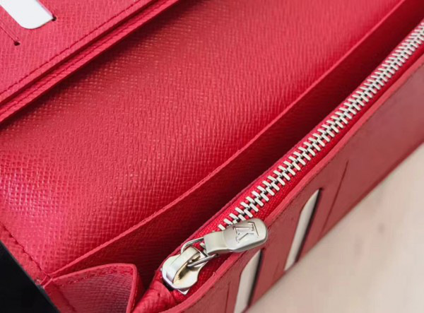 l0vis Vvtt0n svp*me wallet red 3179