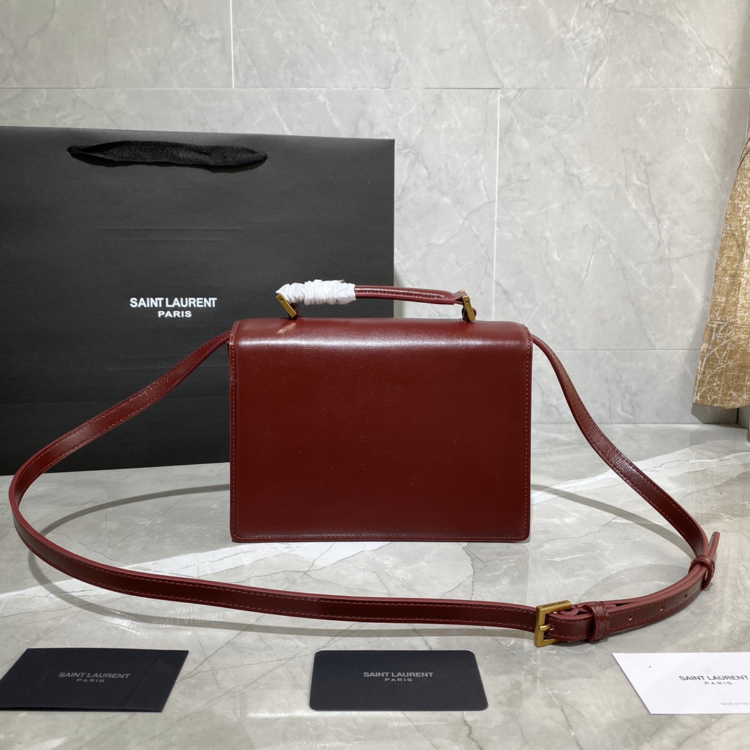 Y51 medium bellechasse in leather burgundy and golden 482051 22 x 16 x 9 cm